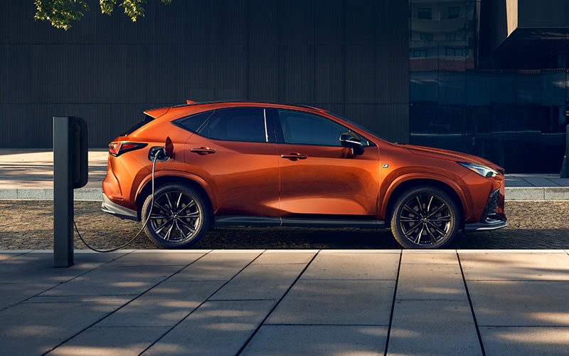 Exterior of the Lexus NX Plug-in Hybrid Electric Vehicle shown in Cadmium Orange