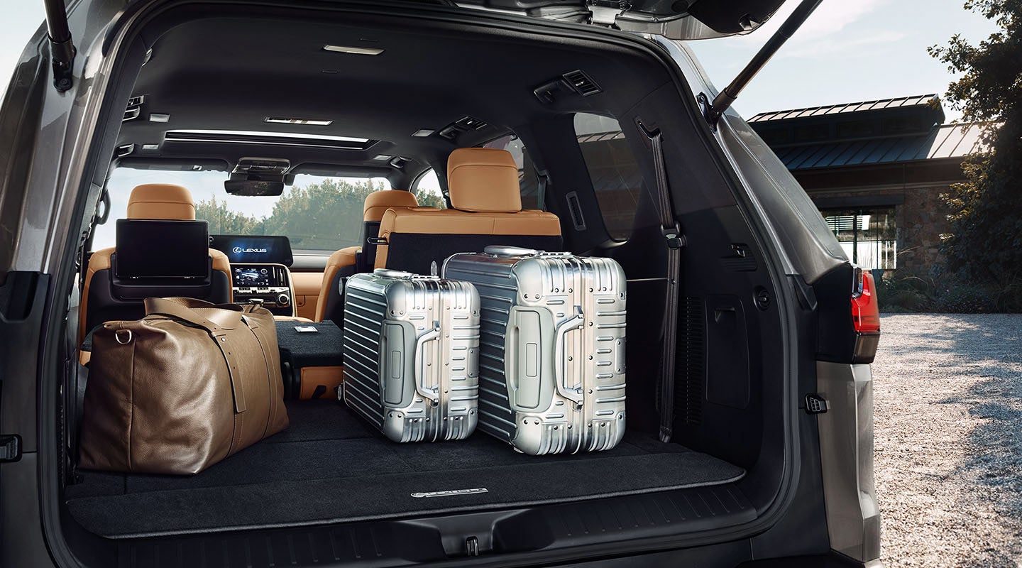 Detail shot of the open trunk of the 2022 Lexus LX 600 with luggage. | Lexus Stevens Creek in San Jose CA
